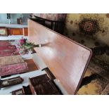 A large mahogany refectory table with a moulded top on ring turned baluster legs