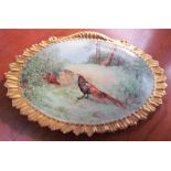 Limoges porcelain plaque decorated with a pheasant and hen in a landscape,