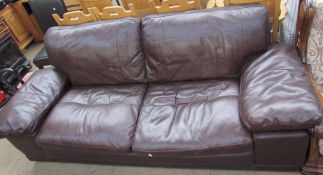 A 20th century brown leather three seater settee