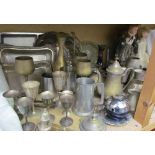 Assorted electroplated wares including goblets, entree dishes, tankards, part tea sets etc,