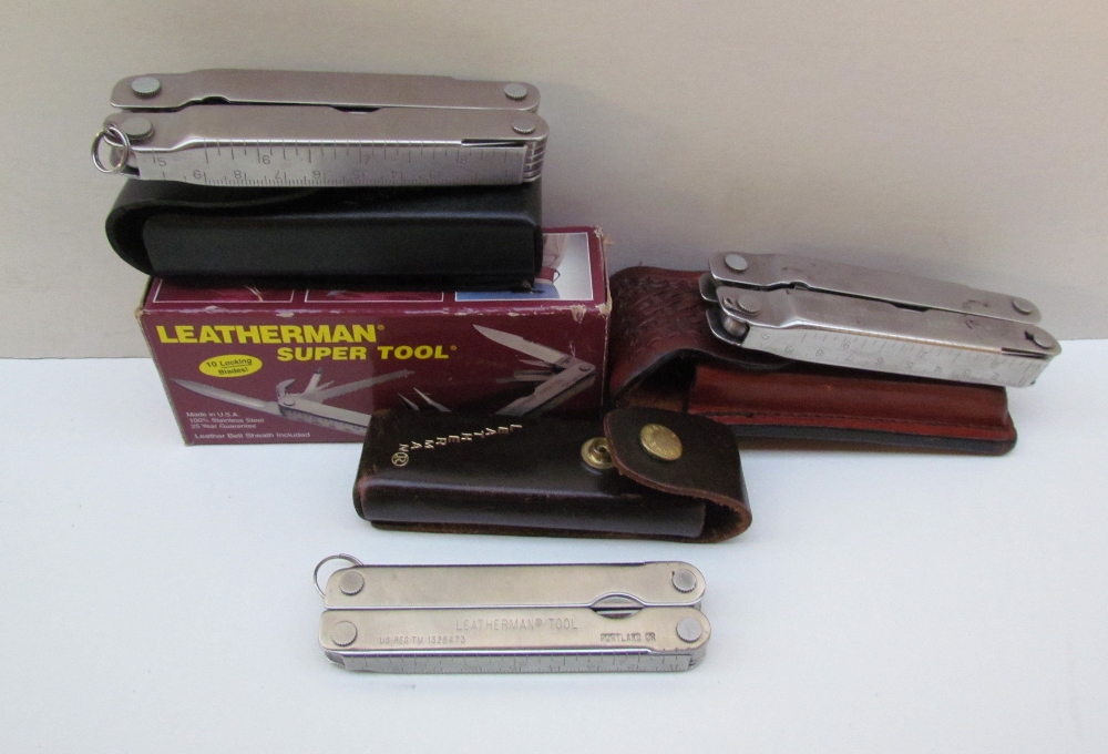 Two Leatherman Supertools together with another leatherman tool folding knife CONDITION