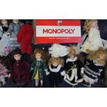 A John Waddington Monopoly board game together with assorted collectors dolls