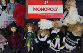 A John Waddington Monopoly board game together with assorted collectors dolls