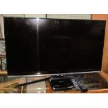 A Samsung 40" flat screen television together with a Humax Freesat (Sold as seen,