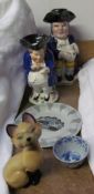 A lidded toby jug of a snuff taker together with another Toby jug, Wade Siamese cat blow up,