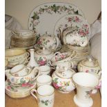 A Wedgwood Charnwood part tea and dinner service together with a Minton Greenwich part dessert set