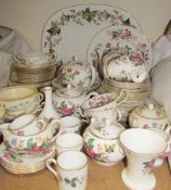 A Wedgwood Charnwood part tea and dinner service together with a Minton Greenwich part dessert set