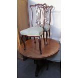 A Victorian mahogany supper table together with a set of four Edwardian mahogany salon chairs