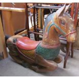 A Child's rocking horse with raised head,