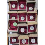 A set of twelve Crummles Beatrix Potter enamel boxes