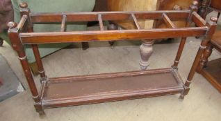 An Edwardian mahogany umbrella stand