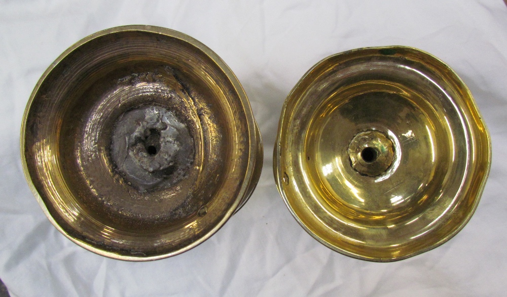 A 17th century style brass candlestick with central drip pan on a spreading foot, - Image 2 of 2