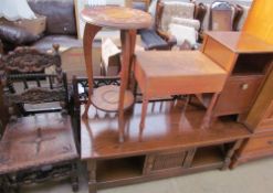 A 20th century oak coffee table together with a bedside cabinet, a commode,