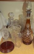 An amber glass and white metal mounted decanter together with glass vases,