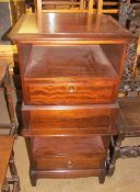 A pair of stag dressing tables together with an alabaster table lamp