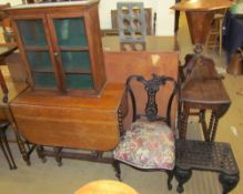 An oak gate leg dining table together with a table top display cabinet,