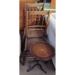 A pair of 19th century spindle back dining chairs together with a wine table