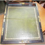 A 19th century ebonised laptop desk with a sloping leather inset writing surface and a