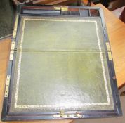 A 19th century ebonised laptop desk with a sloping leather inset writing surface and a