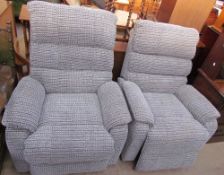 A pair of upholstered electric reclining chairs (Sold as seen,