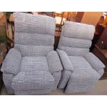 A pair of upholstered electric reclining chairs (Sold as seen,