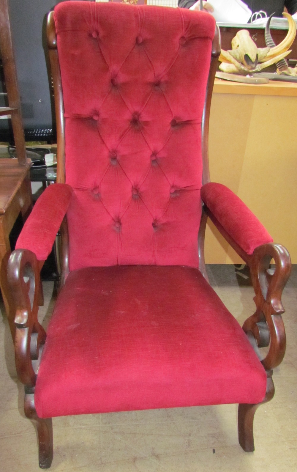 A Victorian rosewood library chair,