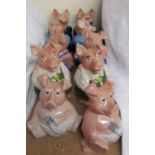 Two sets of Wade Natwest pig money boxes, including Father, Mother, Brother,
