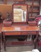 An Edwardian mahogany dressing table, with a rectangular mirror,