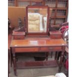 An Edwardian mahogany dressing table, with a rectangular mirror,