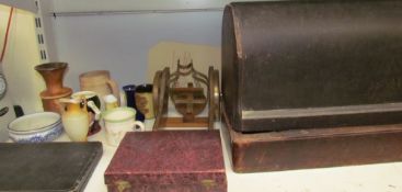 A sewing machine together with cased flatwares,