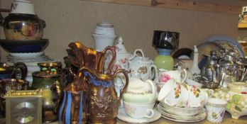 A large lot including assorted copper lustre jugs together with drinking glasses, part tea sets,