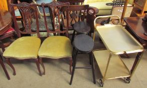 A pair of upholstered salon chairs together with a pair of stools and a tea trolley