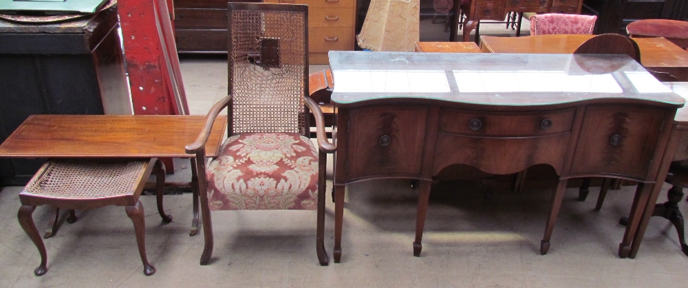A mahogany sideboard together with a mahogany coffee table,