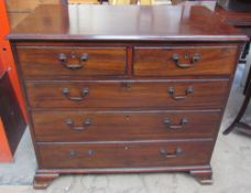 A George III mahogany chest of drawers,