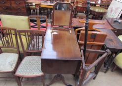 A pair of bedroom chairs together with an upholstered dining chair, another bedroom chair,