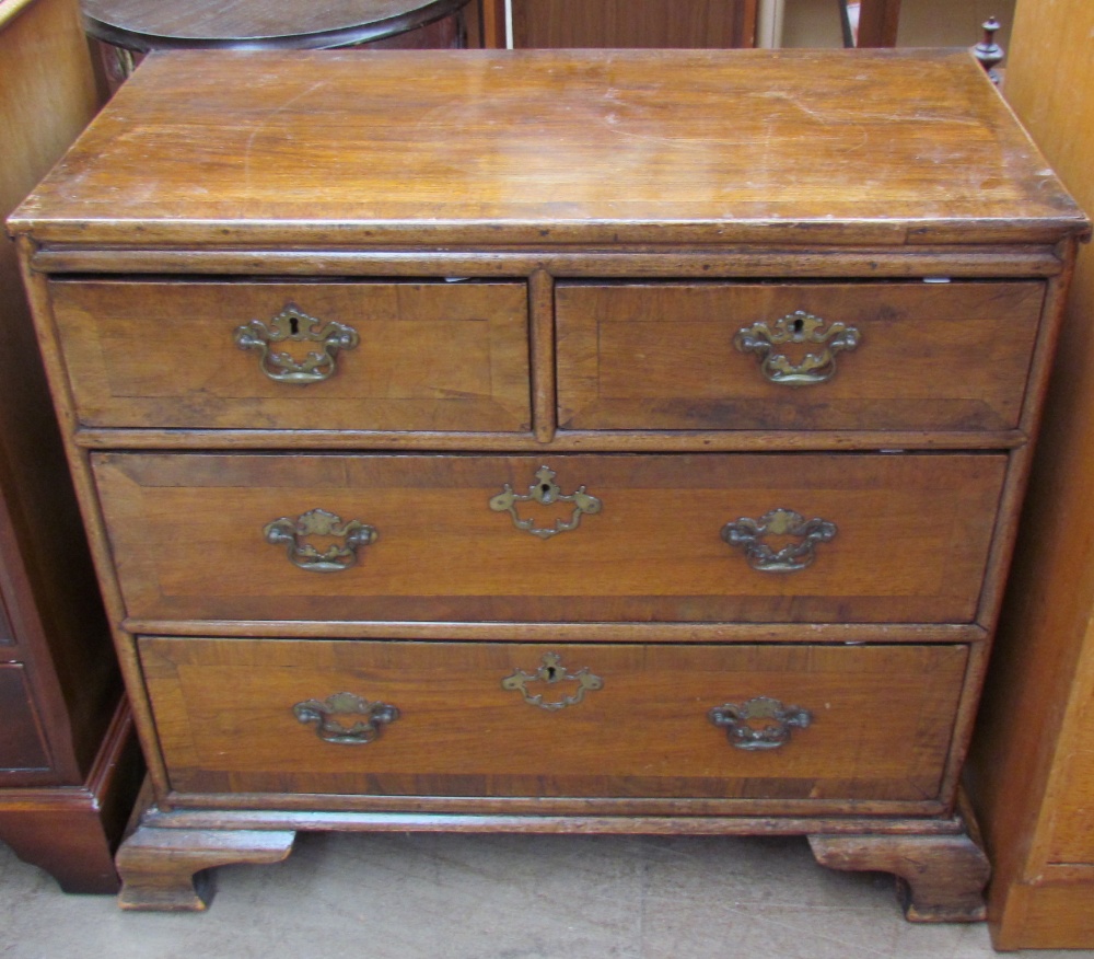 A 19th century walnut chest,