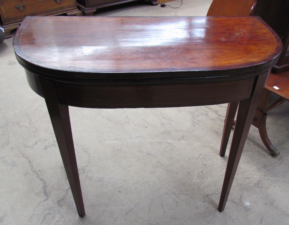 A 19th century mahogany tea table,