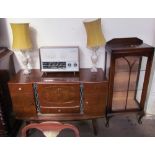 A mid-20th century walnut drinks cabinet / sideboard together with an Ekco 355 radio,