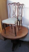 A Victorian mahogany supper table together with a set of four Edwardian mahogany salon chairs