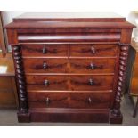A large Victorian mahogany chest of drawers with a frieze drawer,