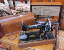 A Cossor Melody Master 523A walnut framed radio together with a Singer sewing machine