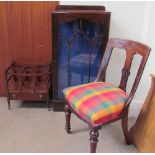 A Victorian chair with a leaf carved back and pad upholstered seat on turned legs together with a