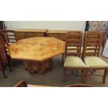 A modern dining room suite comprising an octagonal topped table, eight chairs, a sideboard,