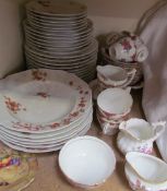 A Limoges floral decorated part dinner set together with an Aynsley part tea set,