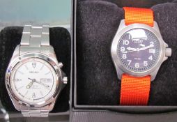 A Citizen Eco-Drive WR200 wristwatch together with a Seiko Kinetic wristwatch