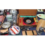 A Roulette game together with a briefcase, decanters, clocks, tie press,