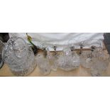 A cut glass decanter together with assorted glass bowls,