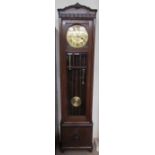 A 20th century oak framed three train long case clock,