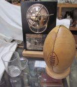 An England Rugby World Champions 2003 trophy together with a tulipwood rugby ball on a maple stand