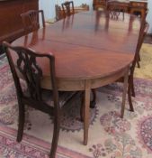 A pair of 19th century D end tables, extended and adapted to a dining table,